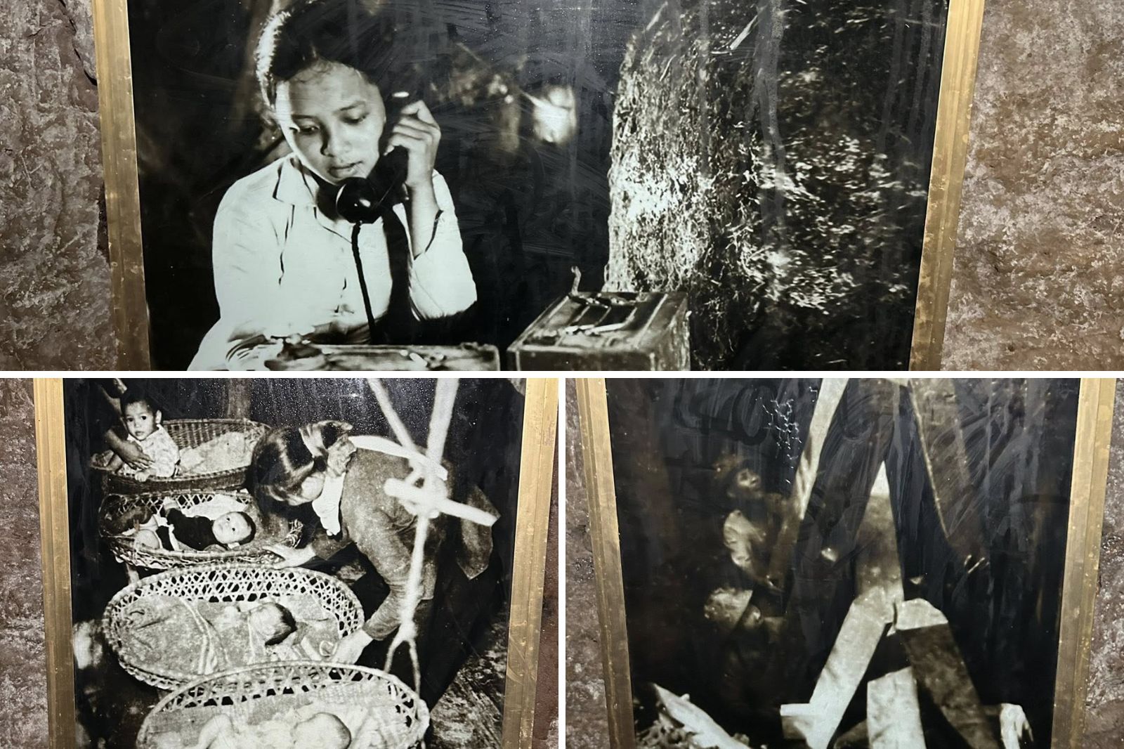 Những hình ảnh được treo hai bên lối đi của địa đạo 